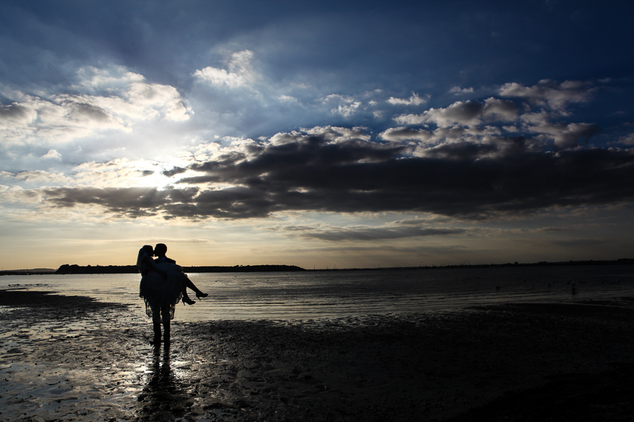 Bride and groom wedding photo on beach